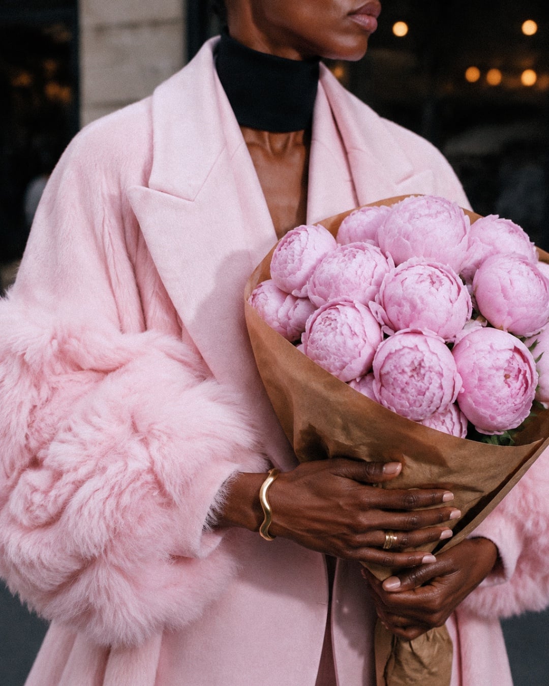 Between shows: Twenty peonies, held like a handbag