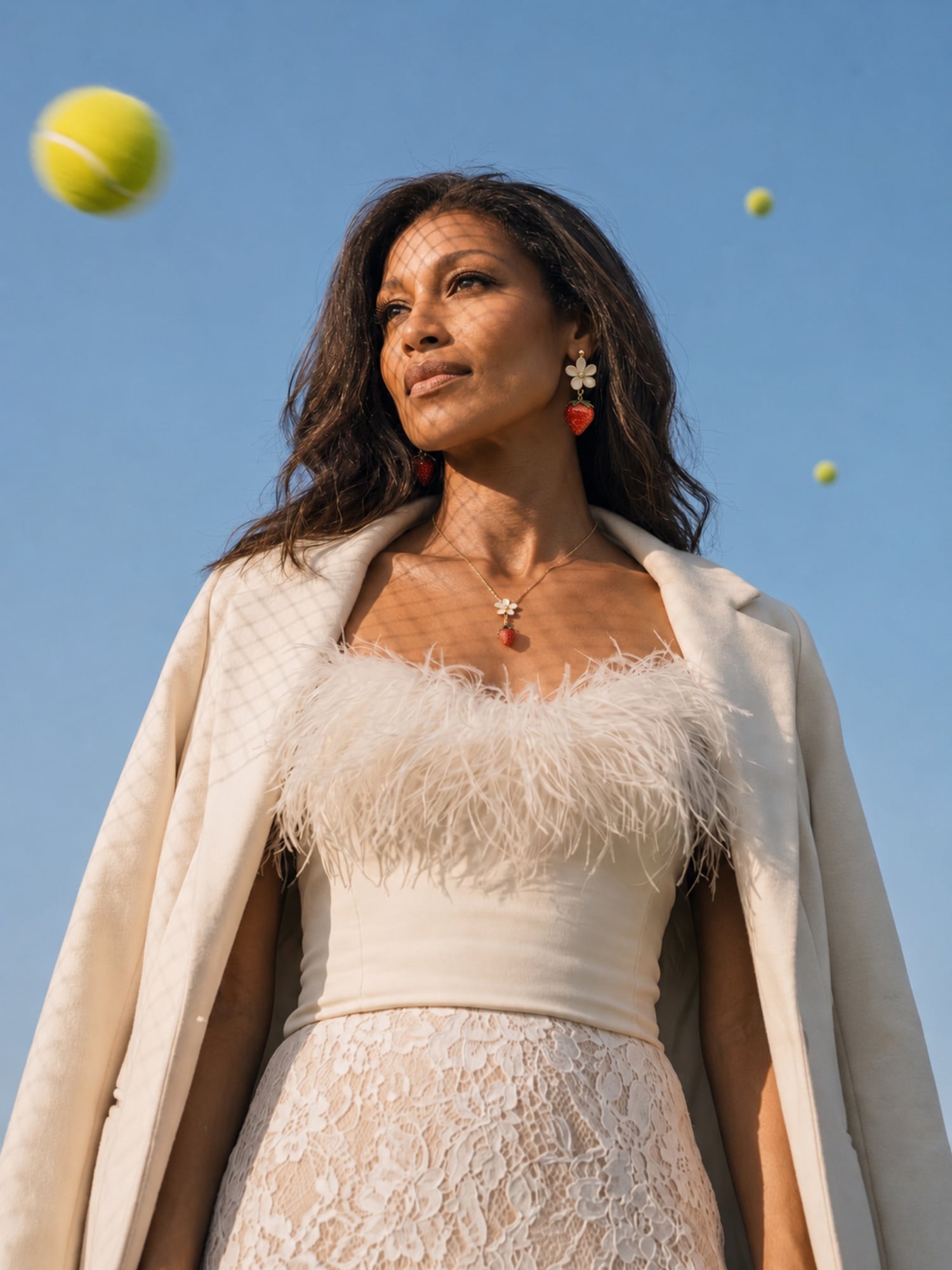 The sweetest match: Portrait under a sky of tennis balls
