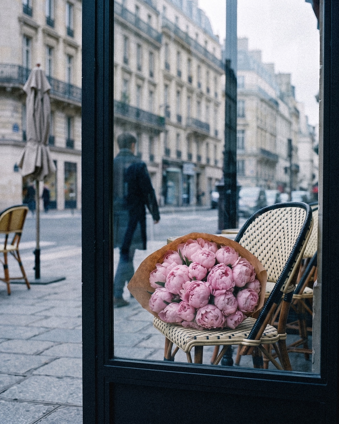 Between shows: Peonies on a cafe chair